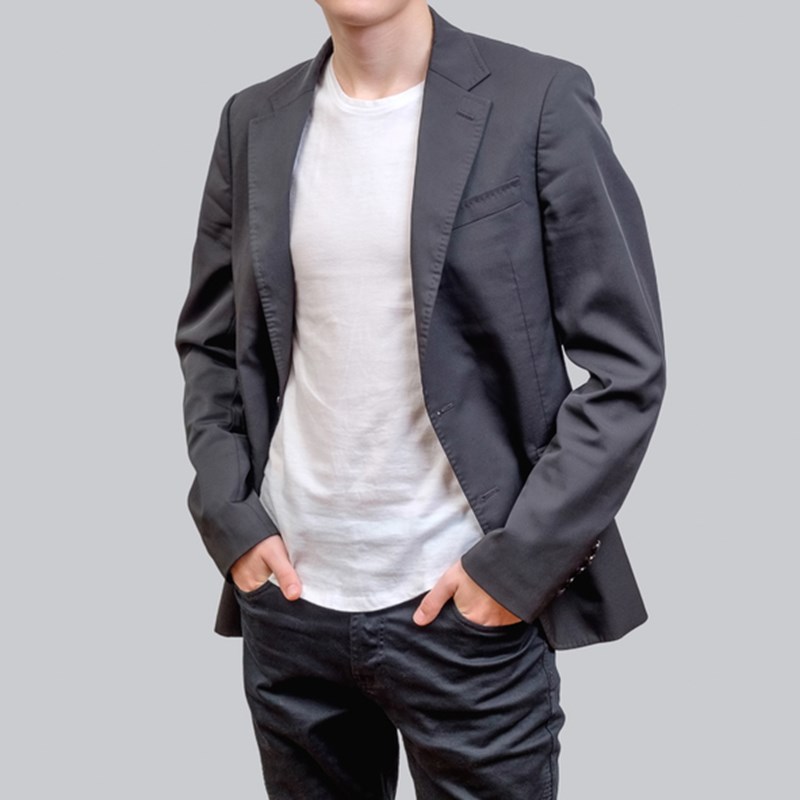MAN WITH GREY SUIT AND WHITE T-SHIRT