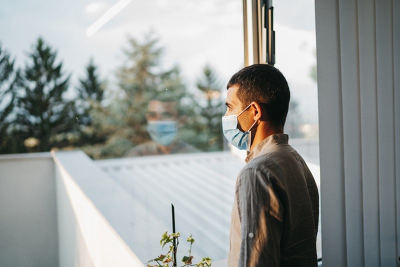MAN WITH PROTECTOVE MASK
