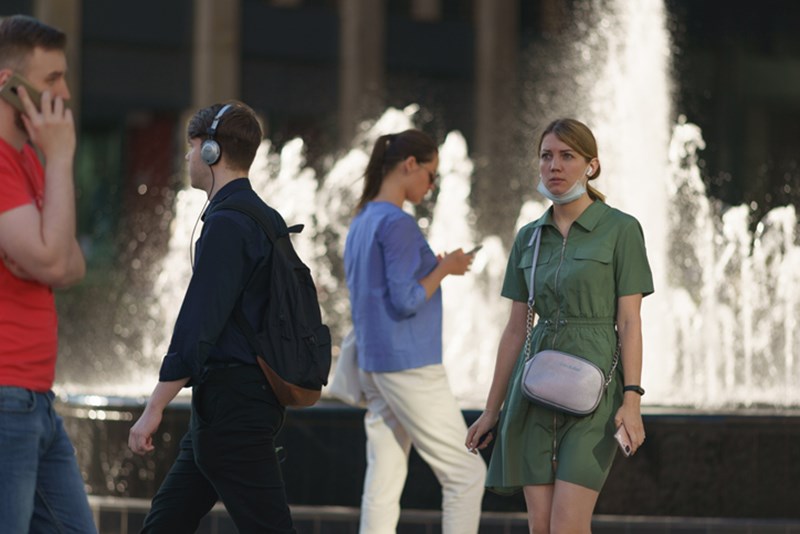 PEOPLE WEARING PROTECTIVE FACE MASKS