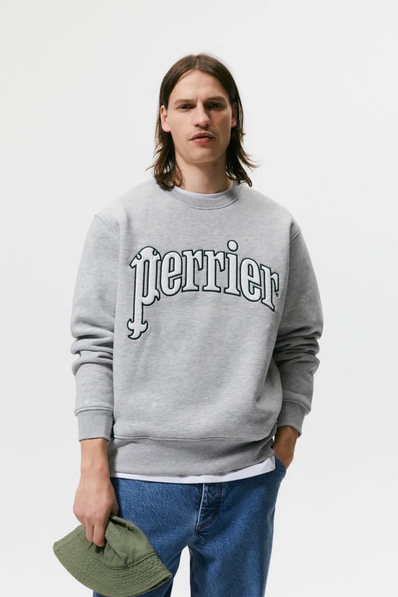 MODEL WEARING A ZARA SWEATER