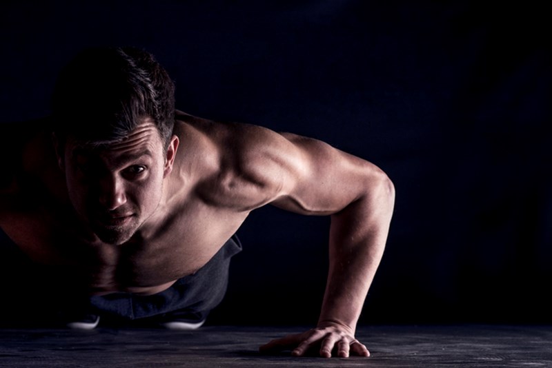 MAN DOING PUSH-UPS
