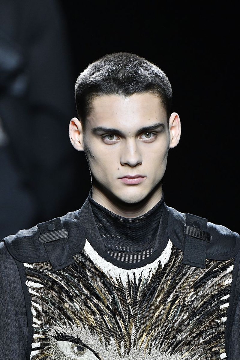 MALE MODEL WITH INTERESTING HAIRCUT