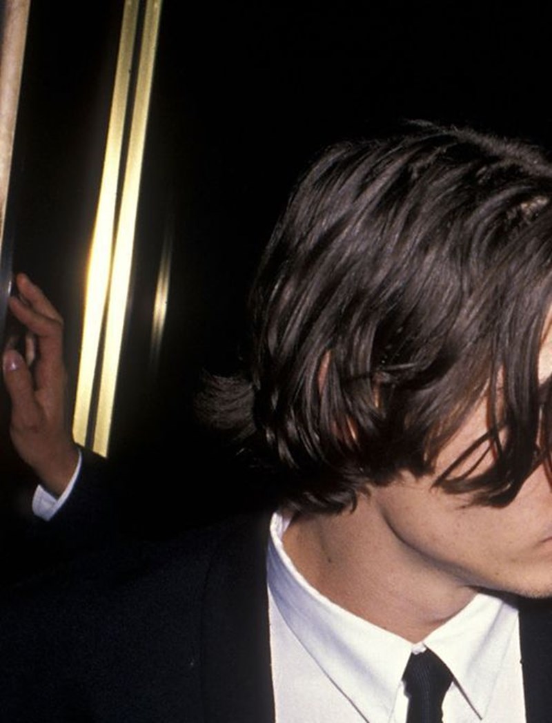 MALE MODEL WITH INTERESTING HAIRCUT