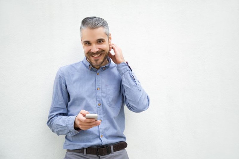 YOUNG MAN WITH GREY HAIR
