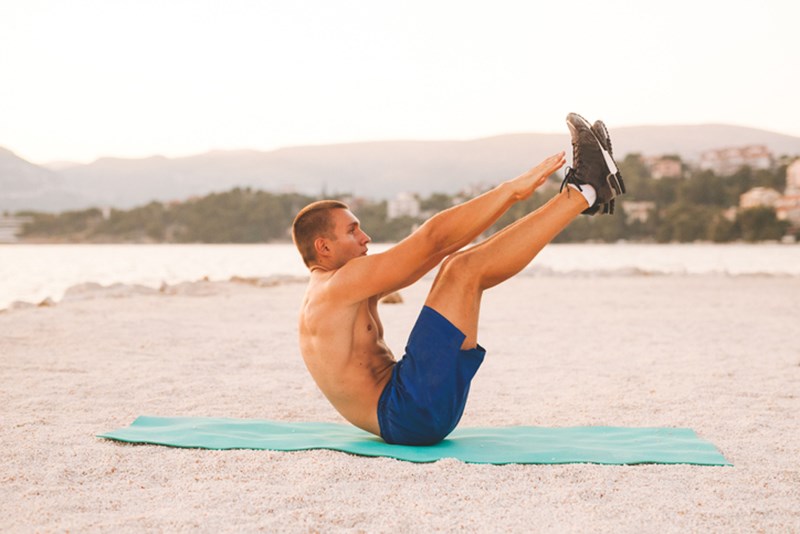 WORKING OUT ON THE BEACH